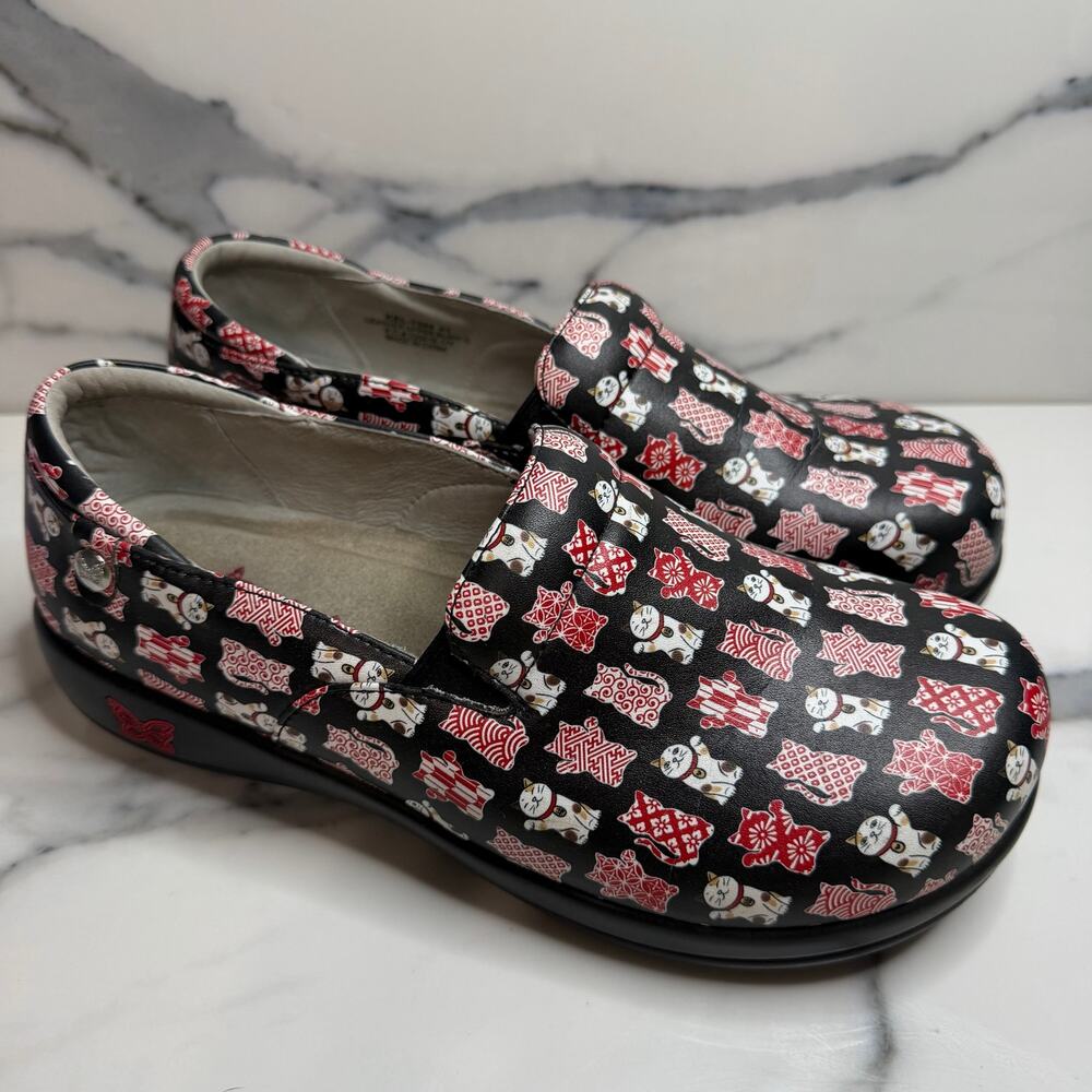 Alegria Lucky Cat Black Clog Mules with Red and White Pattern